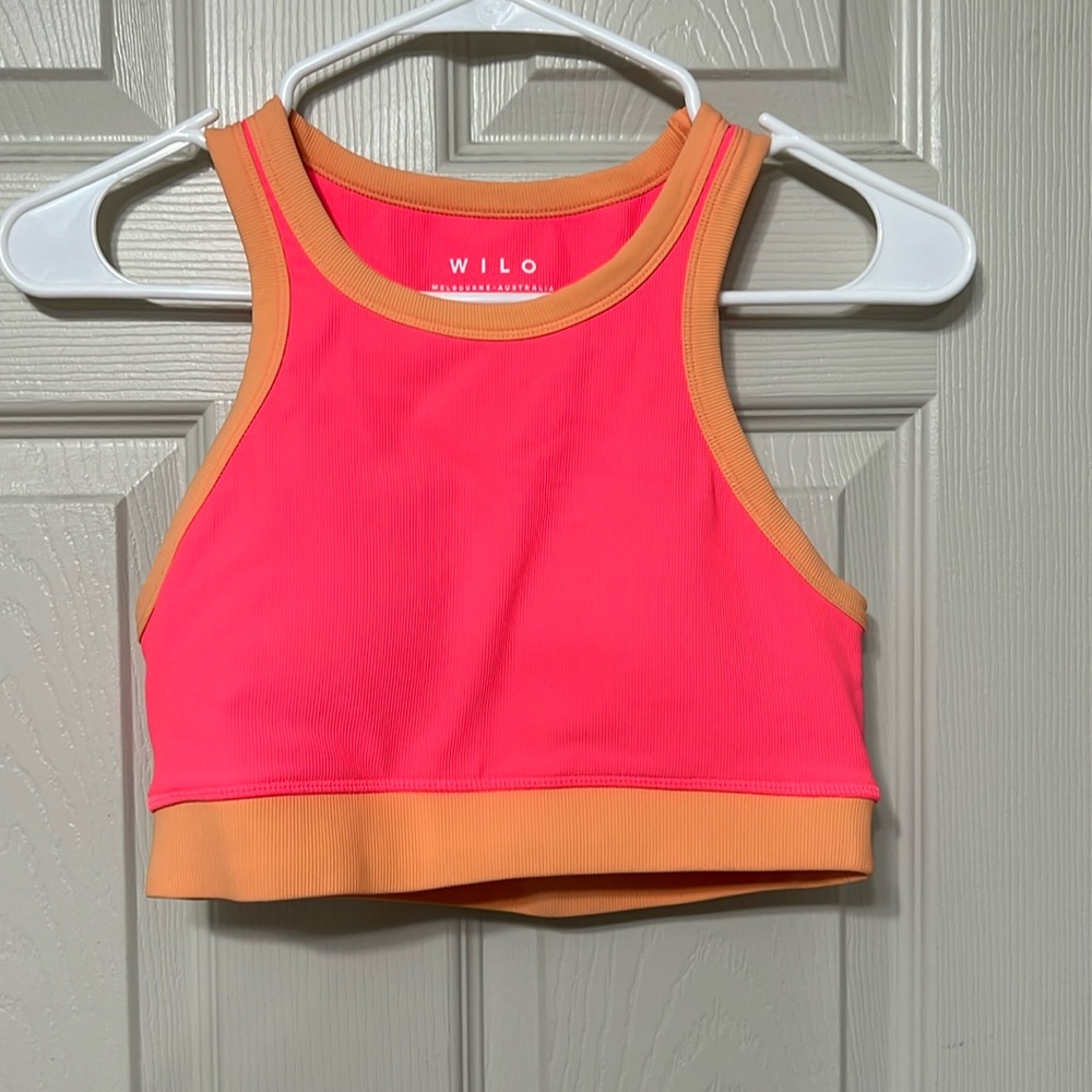 Bright pink and orange, high neck sports bra